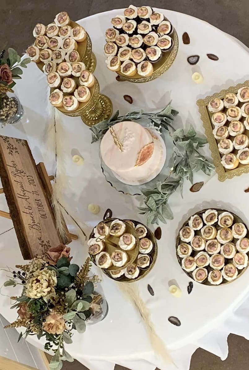 Delightful hors d'oeuvres on a round table at a wedding.