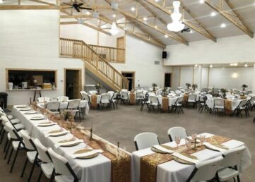 Inside the Barns wedding and event venue with tables set for wedding.