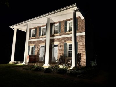 Ross Mansion at The Barns of Marengo Cave photographed dramatically at night. A place to stay and celebrate.